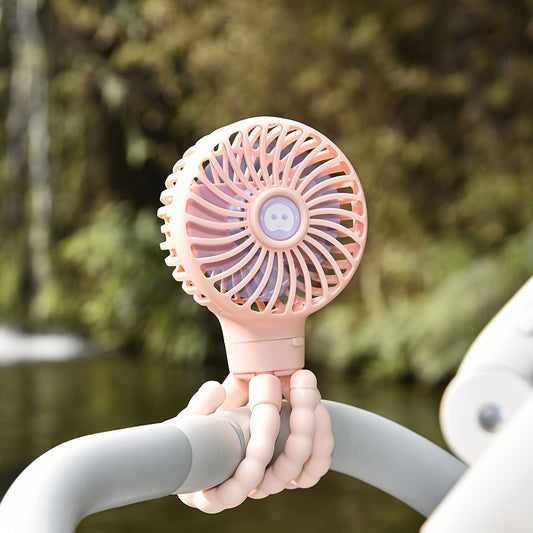 Booqiboy'S Adorable Octopus Fan Is Crafted from Silicone, Making It Safe for Skin. It Features a Flexible Tripod Clip, Offers Three Speed Options, And Can Be Used As a Handheld Fan. This Battery-Operated Device Is Detachable